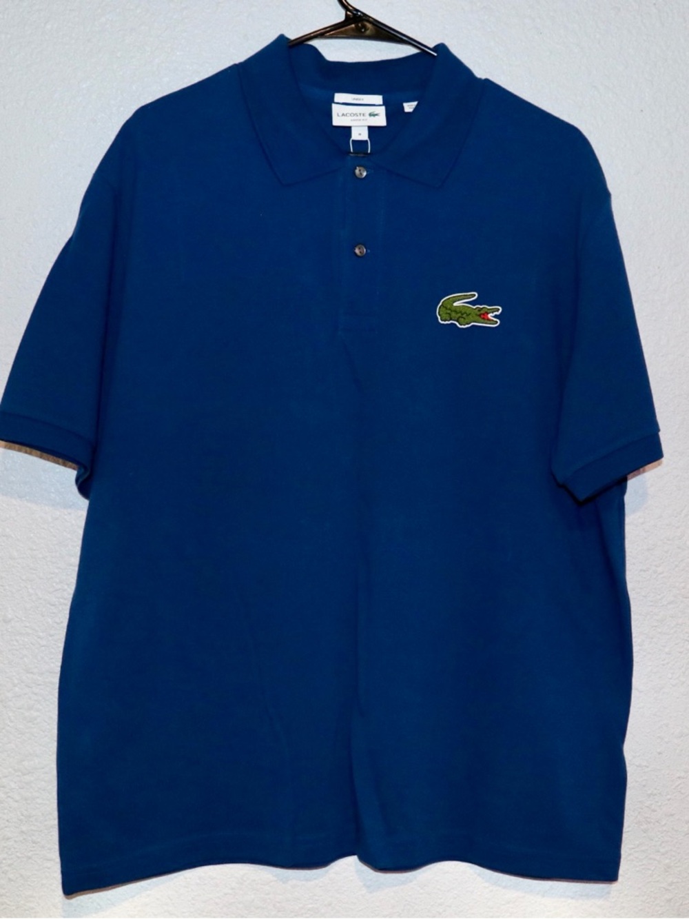 LACOSTE LOOSE FIT POLO SHIRT 
MENS SIZE MEDIUM
BLUE COLORWAY BRAND NEW $135